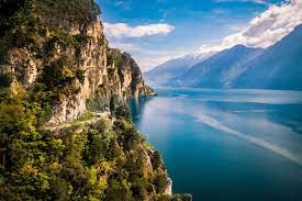 Garda town is situated on a magnificent bay surrounded by lush green hills. Visiting Lake Garda In Italy Travel Guide By Christine Abroad
