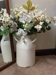 Floral Arrangement Placed In A Large Old Milk Jug Perfect Farmhouse Decor Jug Decor Milk Jug Vase Old Milk Jugs