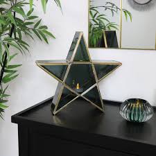 Check spelling or type a new query. Black Gold Glass Star Candle Holder