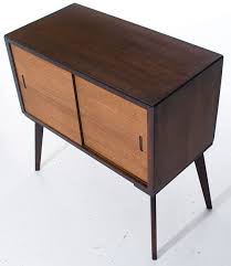 Fall front cabinet door reveals record storage, with divided slots that are labeled. Avalon 1950s Record Storage Cabinet On Ebay Retro To Go