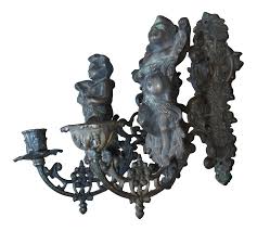 When illuminated with a candle the candlelight creates soft reflections on the tree branches and interesting shadows on the wall. Antique Victorian Bronze Figura Lcherub Candelabras Wall Sconces A Pair Chairish