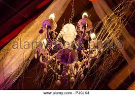 I am a big believer of all things romance, and the one prop that instantly pops in the head is fairy lights. Hanging Chandelier And Tulle Wedding Lighting Stock Photo Alamy
