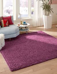 The primary color is eggplant purple. Eggplant Purple 8 X 8 Solid Shag Square Rug Esalerugs