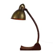 The sort you see that combines tubular bent. Rusty Old Industrial Desk Light 1940s 1189