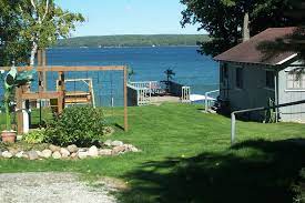 Lake michigan boasts a number of stunning beaches that are hubs for swimming, sunbathing and water sports during the summer months. Hubbard Lake Michigan Fishing West Wind Cottages Lodging Getaways