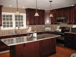 Cherry Cabinets With New Caledonia Granite Countertops Here Are Some Pics Of Our Dark Cab Cherry Cabinets Kitchen Kitchen Cabinets And Granite Kitchen Design