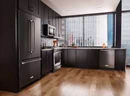 Slate appliances, or grey, create another versatile option when it comes to matching kitchen cabinet colors. Be Bold With Black Whirlpool Corporation