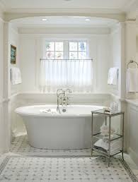 Firstly, their design alone is enough to add sophistication that a built in tub can't for one, they are not attached to the walls or have any surrounding installments. Little Luxury 30 Bathrooms That Delight With A Side Table For The Bathtub