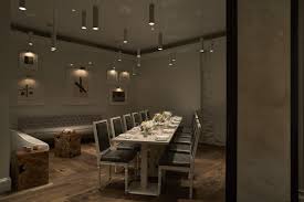 The second floor private dining room at officina can accommodate up to 12 guests around a single table. Private Dining Kinship