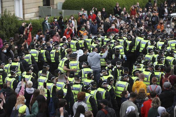 Scotland: 2 held for migration breaches freed after protest | AP News