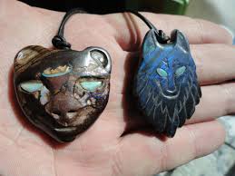 Pendant Wildcat S Carved In Koroit Opal From Queensland Australia With Lighing Ride Eyes Pendant Wolf Head Carved In Spectrolit From Ylama Finland With Wello O