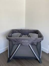 With a simple pull up from the middle, the legs naturally fold together, creating a compact package that weighs only about 24 pounds and that fits easily into its own carrying case. Nuna Sena Air Mini Crib Travel Playpen Playard In Graphite Ebay