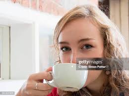 Folkestone Kent England 24 March 2019 Young Woman Drinking Coffee Outside  Coffee Shop High-Res Stock Photo