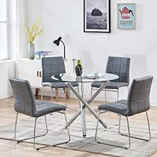 Dining chairs all departments alexa skills amazon devices amazon global store amazon warehouse apps & games audible audiobooks baby beauty books car & motorbike cds & vinyl classical music clothing computers & accessories digital music diy & tools dvd. Amazon Com Modern Dining Table Chairs Set Round Table With Clear Tempered Glass Top 4 Grey Faux Leather Dining Chairs Set For 4 Person Kitchen Dining Room Table And Chairs Set For Home 1