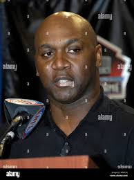 Running back Thurman Thomas of the Buffalo Bills speaks at a press briefing  following his selection to the National Football League Hall of Fame in  Miami