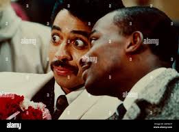 PURPLE RAIN, from left: Morris Day, Jerome Benton, 1984. ph: © Warner Bros. 