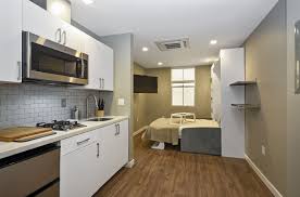 Our Studio Micro Units Come Equipped With Microwave Mini Fridge Cooktop And Central Air Homes Are Furnish Built In Couch Apartments For Rent Urban Apartment