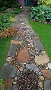 Love The Blend Of Flat Stones And Round Stones Large Ones And Tiny Ones Organic Meets Art Rock Garden Landscaping Backyard Landscaping Garden Paths