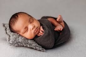 Aunt CC captures sweet baby moments during a session