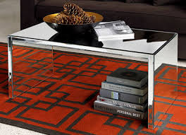 The frame of this mirrored coffee table is made of asian hardwood with silvery finish and golden accents. Mirrored Furniture Roundup Design Sponge