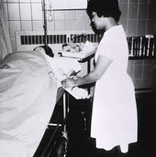 Standing at the patient's bedside in the emergency room, i watch as the phlebotomist adjusts the patient's arm to collect blood samples. West Hudson Hospital Kearny N J Interior View Emergency Room Technician Drawing Blood Sample Digital Collections National Library Of Medicine