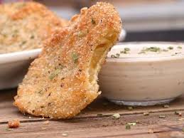 Crispy fried green tomatoes topped with a creamy creole sauce that's loaded with shrimp! Crispy Southern Fried Green Tomatoes Dipped In Buttermilk Cornmeal Bread Crumbs And Spices In 2020 Green Tomato Recipes Fried Green Tomatoes Recipe Tomato Recipes