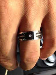 Men S Platinum And Black Wedding Band With Cable Wire And Center Diamond Black Wedding Band Wedding Bands Wedding Rings
