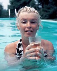 Marilyn Monroe swimming at Richard and Dorothy Rogers' house in Weston,  Connecticut in 1955. Monroe had gone there with Gene Kelly, Milton Greene,  and Greene's wife Amy to cool off