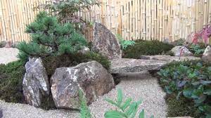 Very Small Karetaki Dry Waterfall With A Stone Bridge In The Corner Of A Small Tsuboniwa Courtyar Japanese Garden Landscape Japanese Garden Courtyard Garden