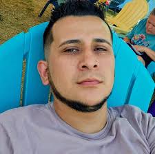 Why is my car's rpm going up randomly and smelling strong gas odor?