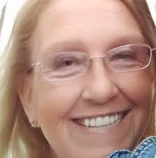 Where is the local swimming hole in the photo?