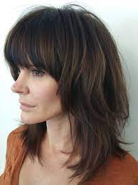 Medium Shag With Full Straight Bangs Medium Shag Haircuts Thick Hair Styles Shag Haircut