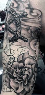 Both the compass and the anchor are naval symbols, so it makes perfect sense to combine them in a single tattoo design. 70 Ship Wheel Tattoo Designs For Men A Meaningful Voyage