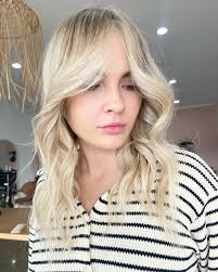 How stunning is the blonde babe. Bright and creamy. #evopro #haircaregroup  #blondebabe #cairnssalon