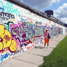 The berlin wall was a guarded concrete barrier that physically and ideologically divided. 9jsztttaw8xeum