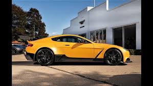 Image result for Sunburst Yellow 2017 Aston Martin