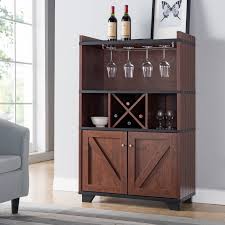 These pieces have cabinets rather than shelves on the top or bottom of the rack. Gracie Oaks Wes 31 25 Wood Standard Baker S Rack With Wine Glass Storage Reviews Wayfair