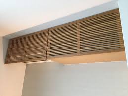 左側がエアコンカバー 右側が収納になっています エアコンカバー リビング エアコン エアコンカバー 室内