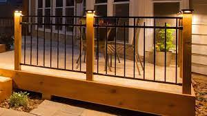 Maybe you would like to learn more about one of these? Fortress Flat Pyramid Post Caps With Led Light Modules Illuminate A Wood And Iron Deck Railing On A Peaceful Backyard De Deck Post Lights Deck Post Post Lights