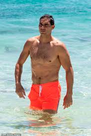 .@rafaelnadal breaks down 10 things he can't live without for @gqsports full #gq10essentials video: A Shirtless Rafael Nadal Enjoys A Swim During A Visit To Rottnest Island On New Year S Day Daily Mail Online
