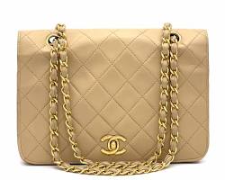 Image of classic Chanel quilted handbag in beige