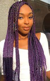 The purple hair color flowing one side provides the person with a smart and neat appearance. Purple Braids
