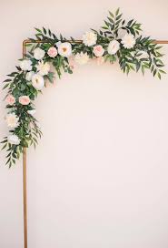 We're using 3 or 4 floral garlands, some of flowers and some of greenery, twisted together to do our arch decor. How To Decorate Your Wedding Arches Or Ceremony Altar
