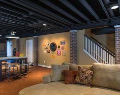 Exposed ductwork painted, polished cement floors, 818 sq.ft. 13 Best Basement Black Ceiling Ideas Black Ceiling Basement Remodeling Basement Design