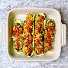 Zucchini take center stage, stuffed with spiced up black beans, red pepper and topped with cheddar. Stuffed Southwestern Style Zucchini Boats Powell Family Cooking