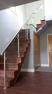 From Denver Glass Interiors Here You Can See Our Stainless Steel Posts And Railing Paired With Our Sq Staircase Design Glass Staircase Stainless Steel Railing