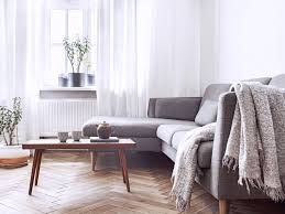 Decorating An Apartment On A Budget Make your rental home uniquely yours with these tips hang inexpensive curtains or fabric along a wall to create a nice feature and provide color and mirrors are a frugal way to enhance a space.