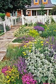 Designed And Installed By Denver Garden Expert Tom Peace The Garden Belonging To Ann Weckbaugh F Garden Landscaping Drought Tolerant Perennials Cottage Garden