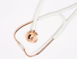 This stethoscope pictured is a white (or black) and rose gold mdf stethoscope and will be blingd to match the sample picture. Close Up Of White Glitter Rose Gold Stethoscope Top Rose Gold Stethoscope Medical Background Cardiology Stethoscope