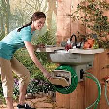 The standard y connector lets you hook up to a sink and garden hose at the same time. This Garden Hose Sink Makes An Instant Outdoor Sink And Every Backyard Needs One